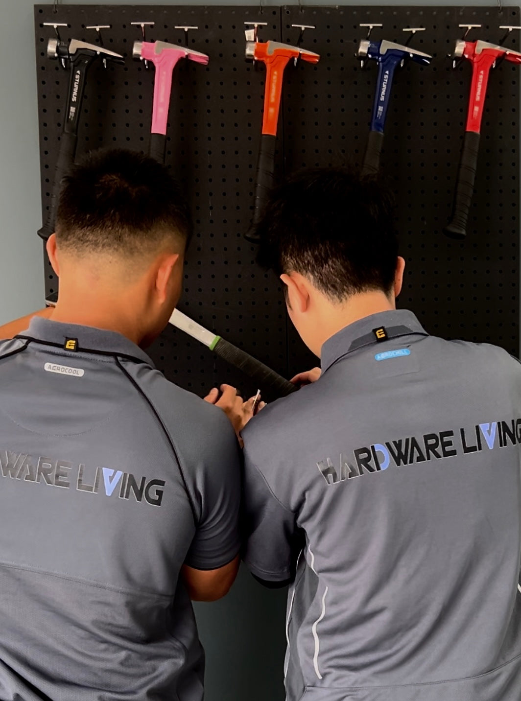 Hardware Living staff wearing uniforms on About Us page